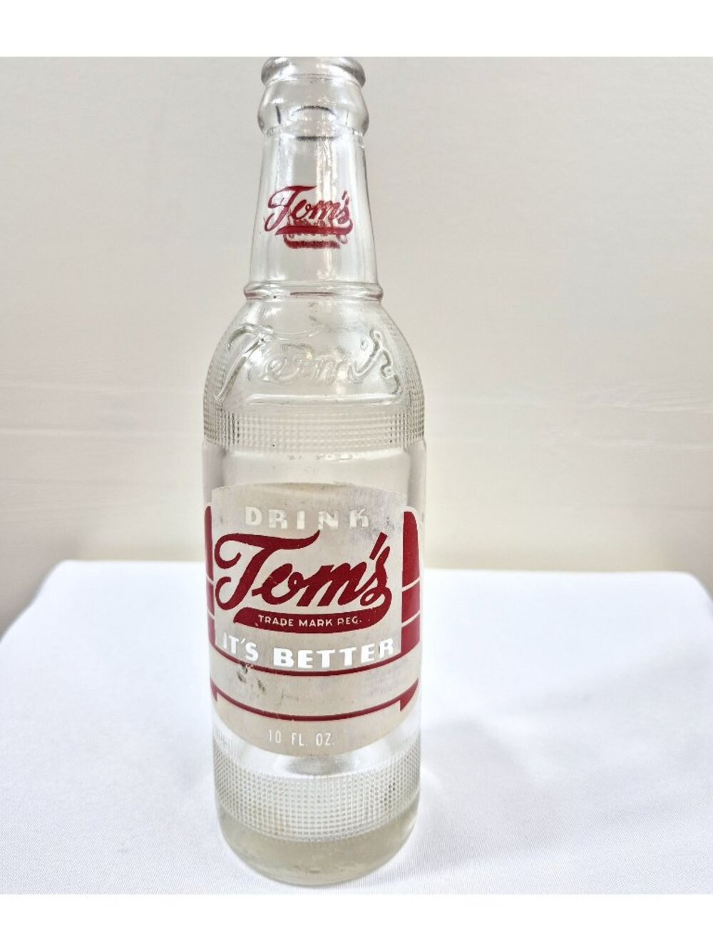 Vintage Tom's It's Better 10oz ACL Soda Bottle Embossed Returnable Red White